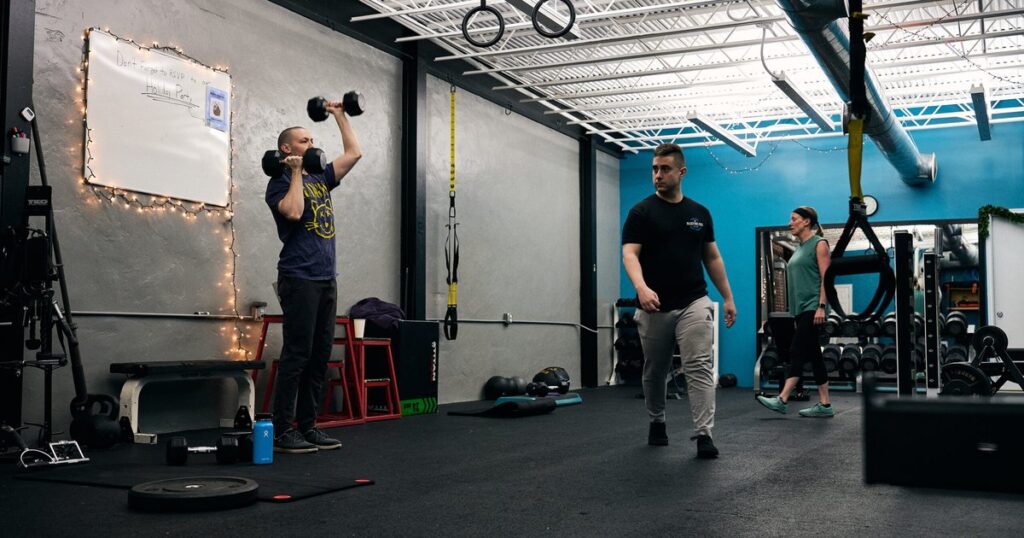 ReDefineRVA personal training studio in Carytown, Richmond, VA — semi-private training session in progress.