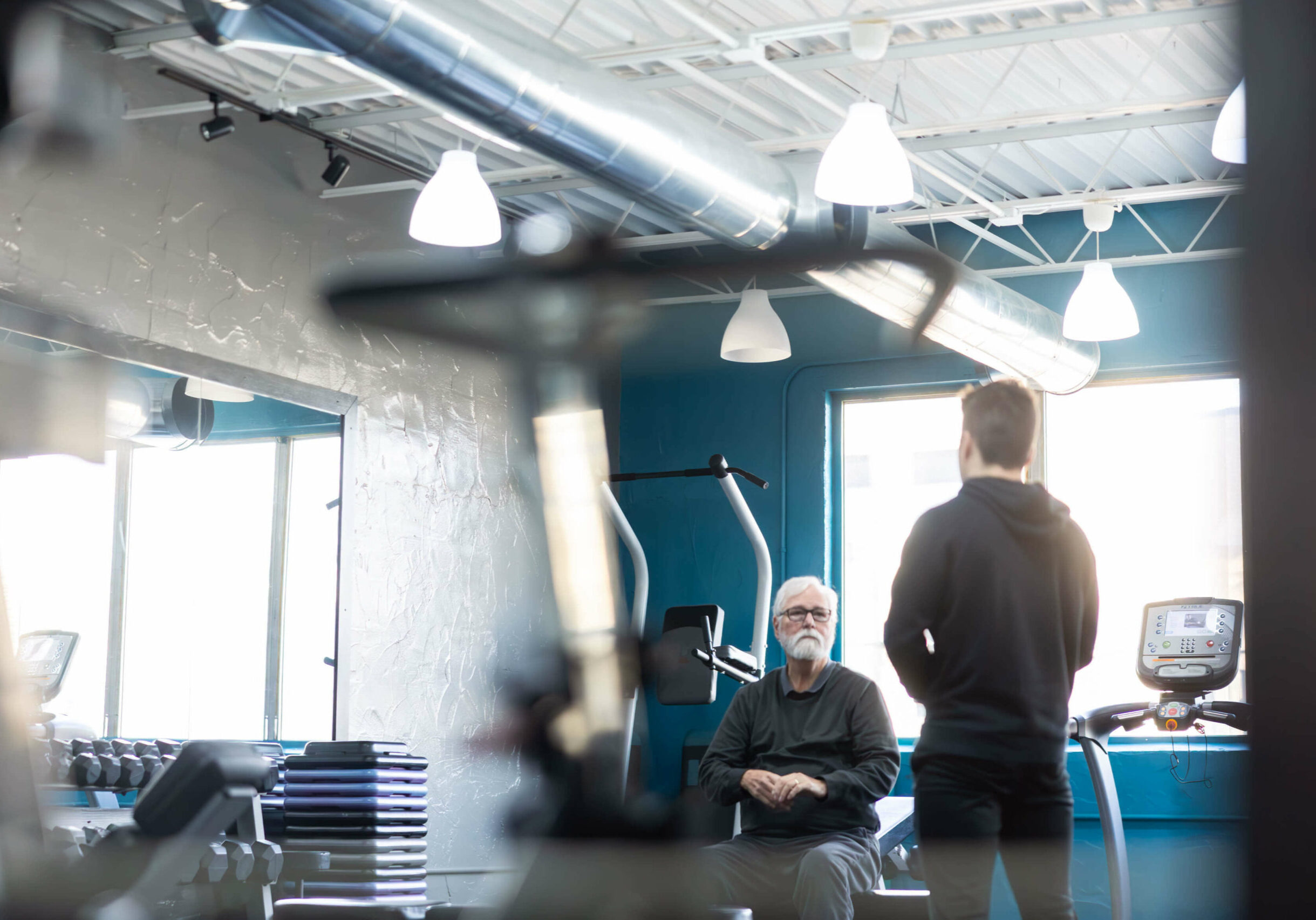 Trainer explaining something to client